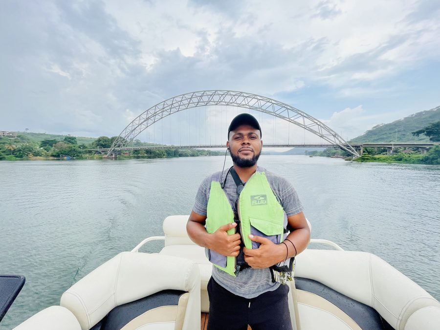 Guest on a boat cruise below the Adomi Bridge at Akosombo