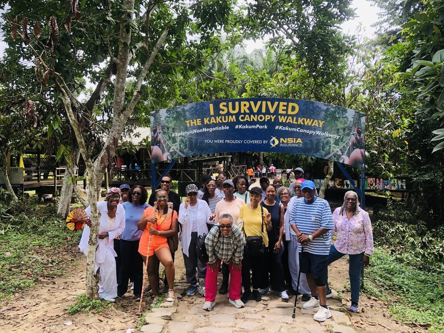 AAG guests at the Kakum Canopy Walkway sign
